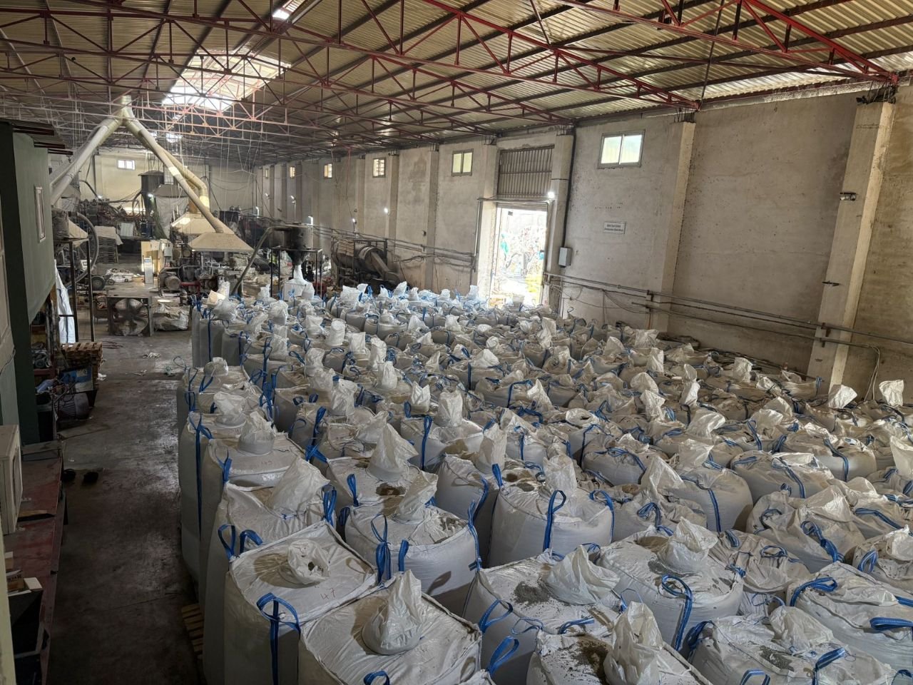 Big-bags of recycled LDPE granules in the warehouse